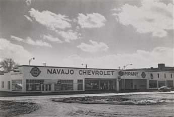 (NAVAJO CHEVROLET COMPANY) Presentation album with 16 photographs chronicling the offices, service workshop, and showrooms of what late